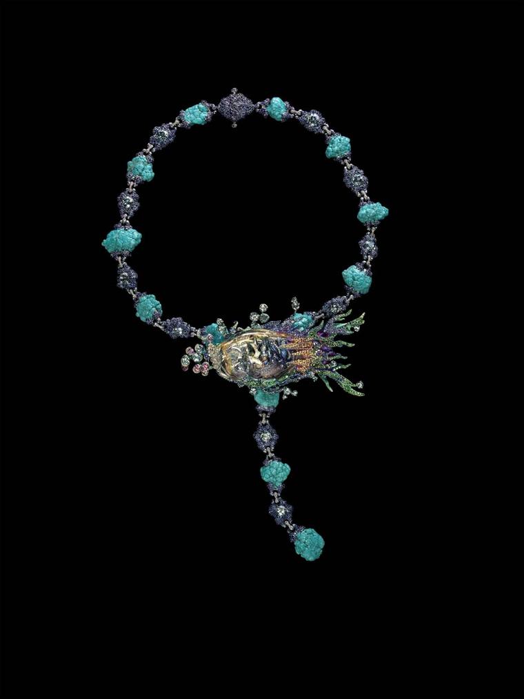 Wallace Chan combines the beauty of a yellow diamond with stunning coloured gemstones including aquamarine, turquoise and sapphire in this beautiful Ebb and Flow design where the fish takes centre stage.